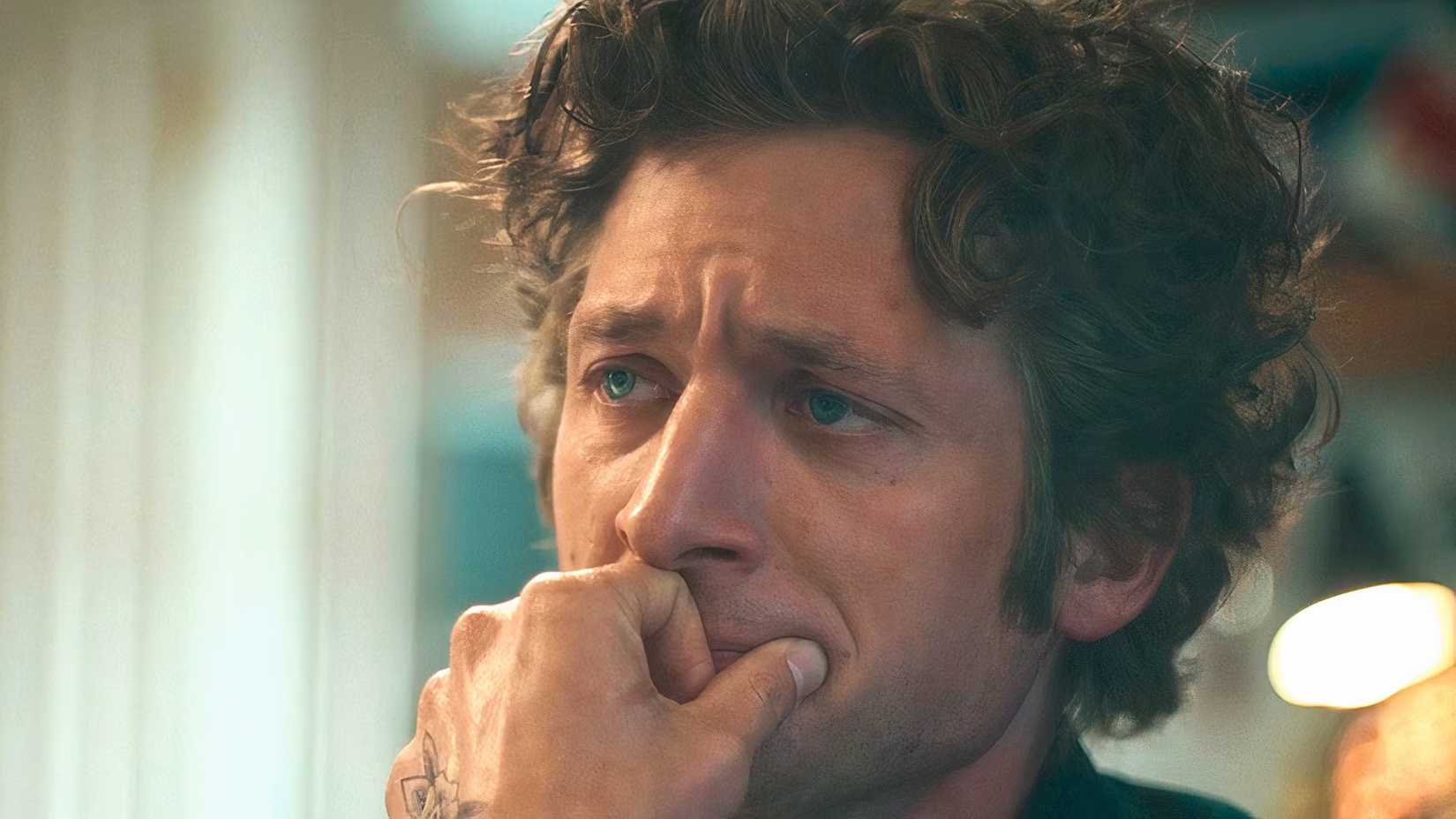 Carmy covering his mouth looking distressed in The Bear season 4 (1)
