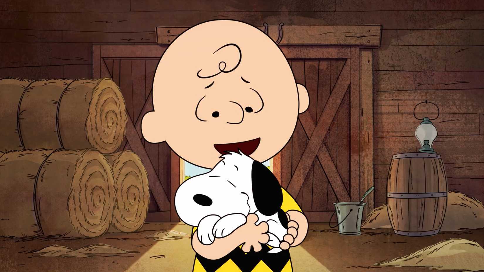 Charlie Brown hugging baby Snoopy in Apple TV's The Snoopy Show