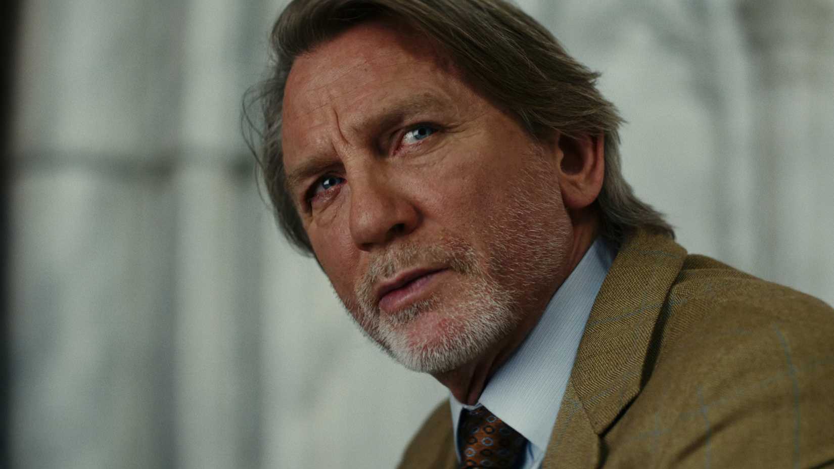 Daniel Craig looking inquisitive as Benoit Blanc in Wake Up Dead Man