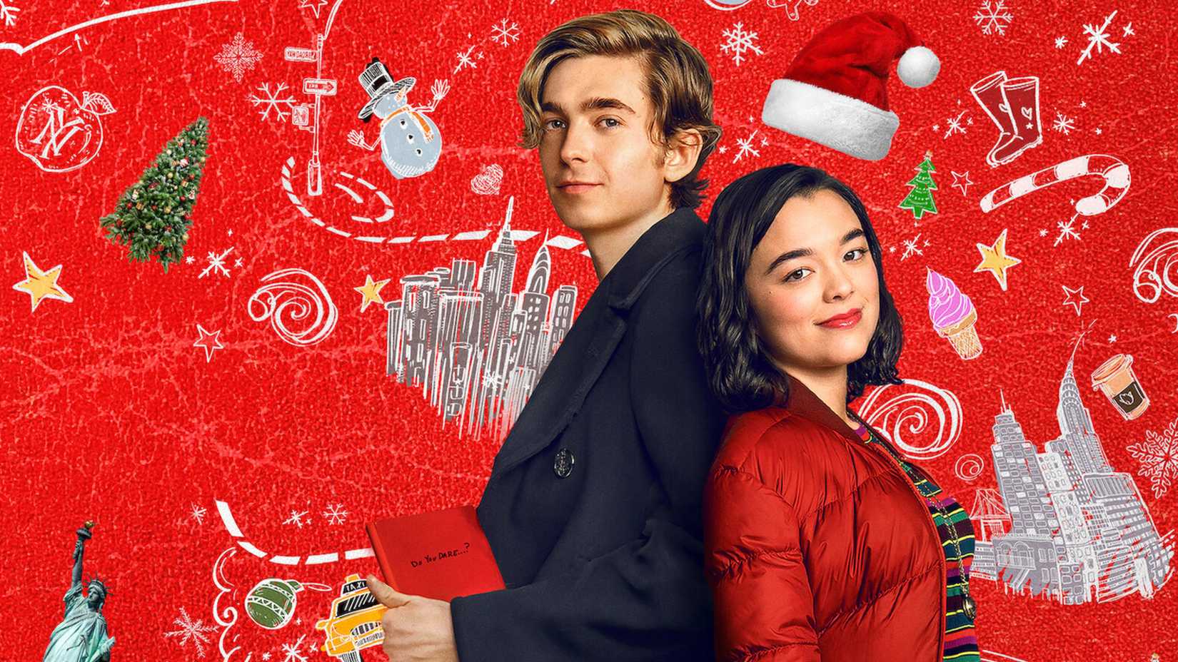 Dash and Lily are back to back with Christmas drawings behind them