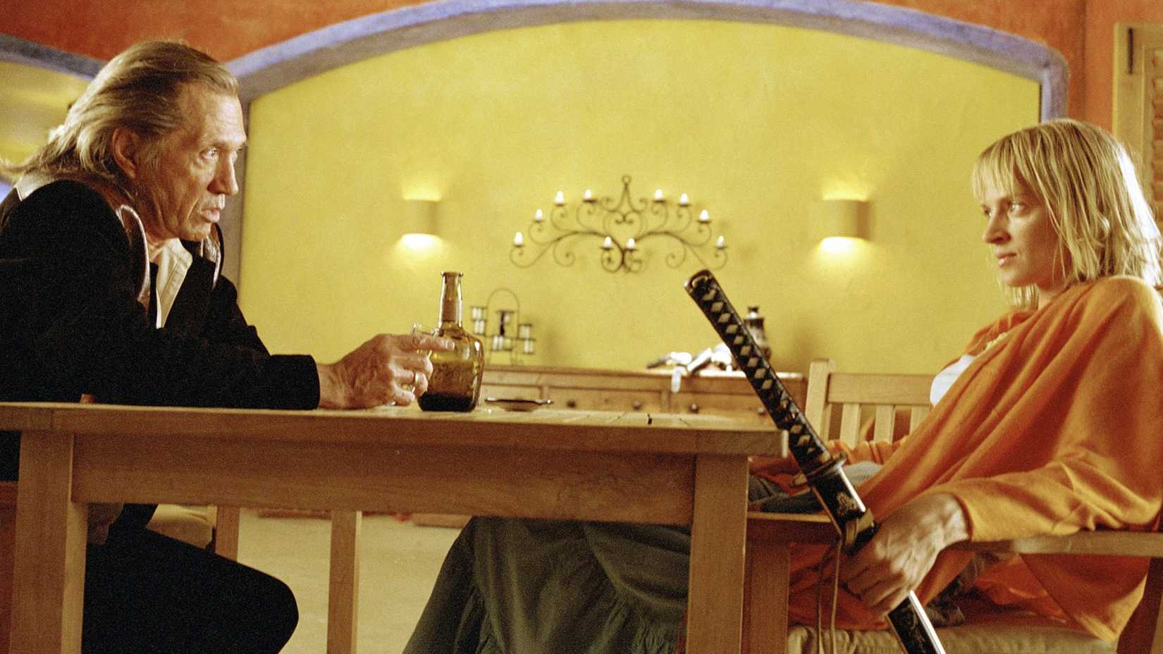 David Carradine as Bill talking to Uma Thurman as The Bride in Kill Bill