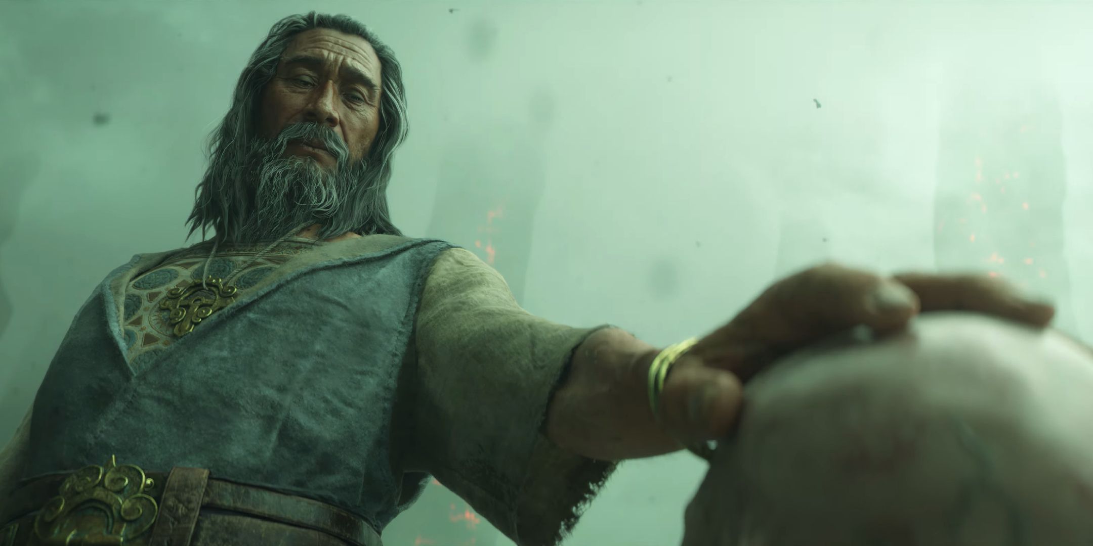 Mano di un personaggio di Diablo 4 Lord of Hatred che si allunga verso un'altra figura