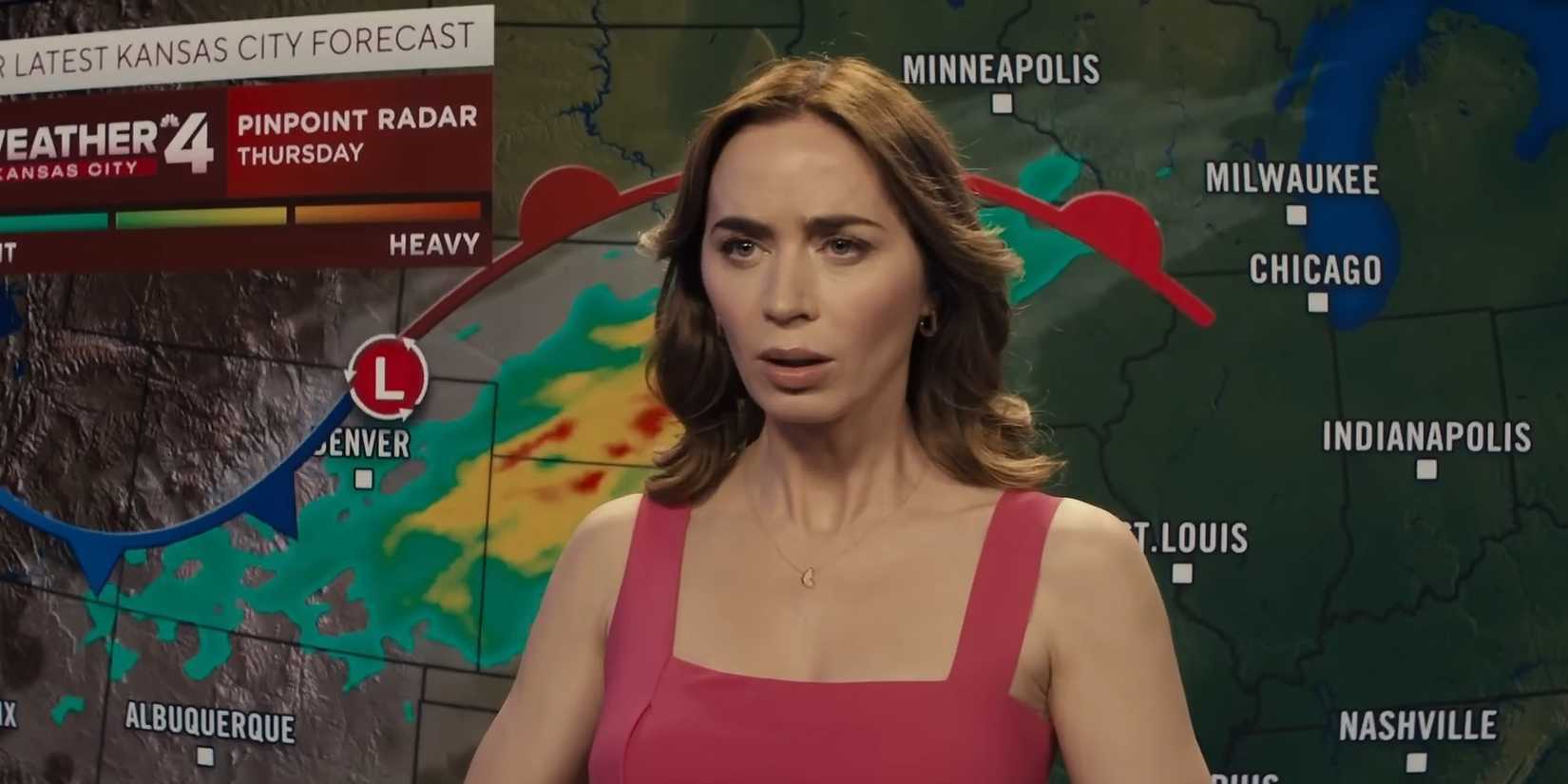 Emily Blunt giving a weather report in Disclosure Day