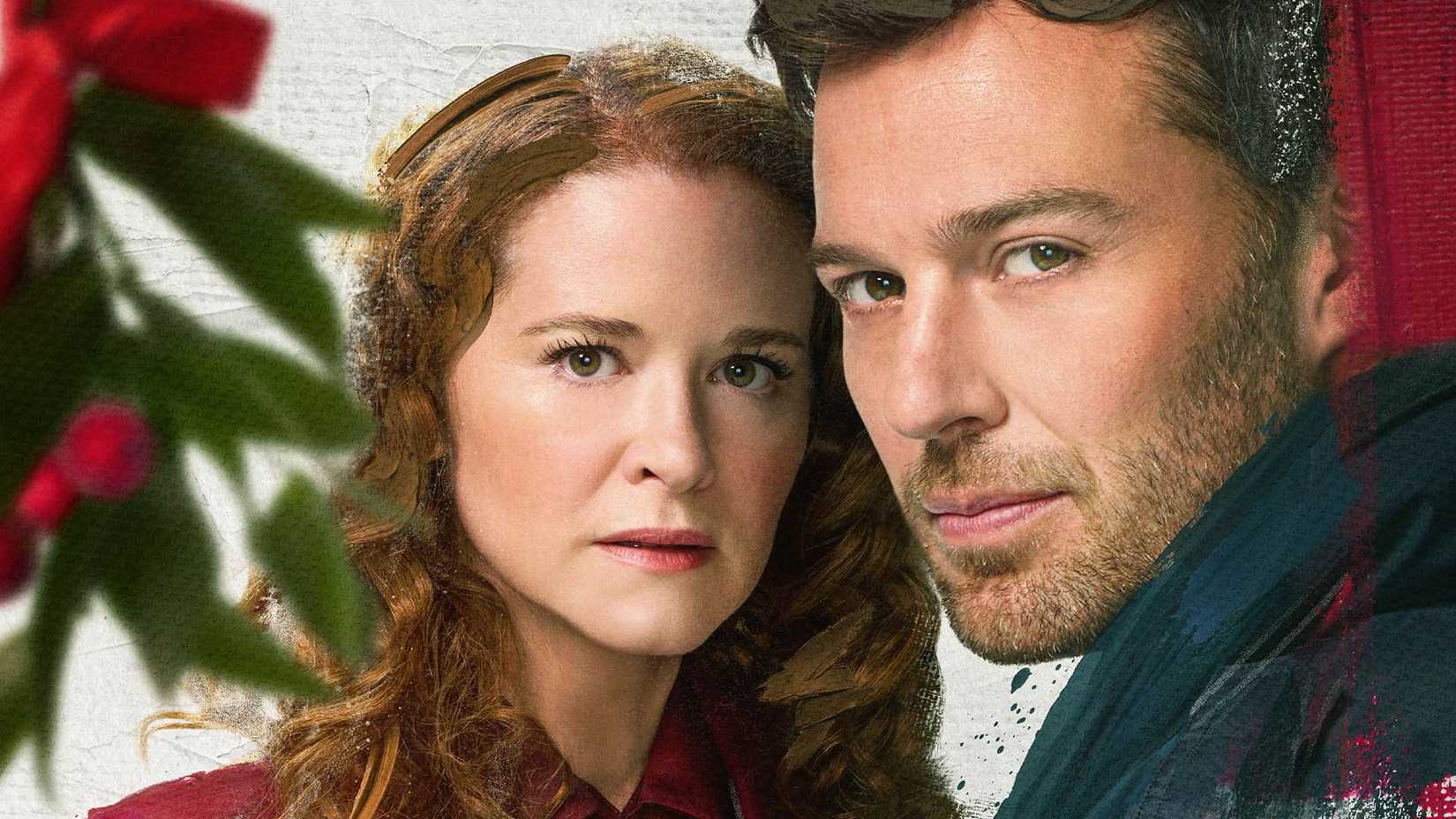 Emily and Sam are in front of a mistletoe on the poster for Mistletoe Murders