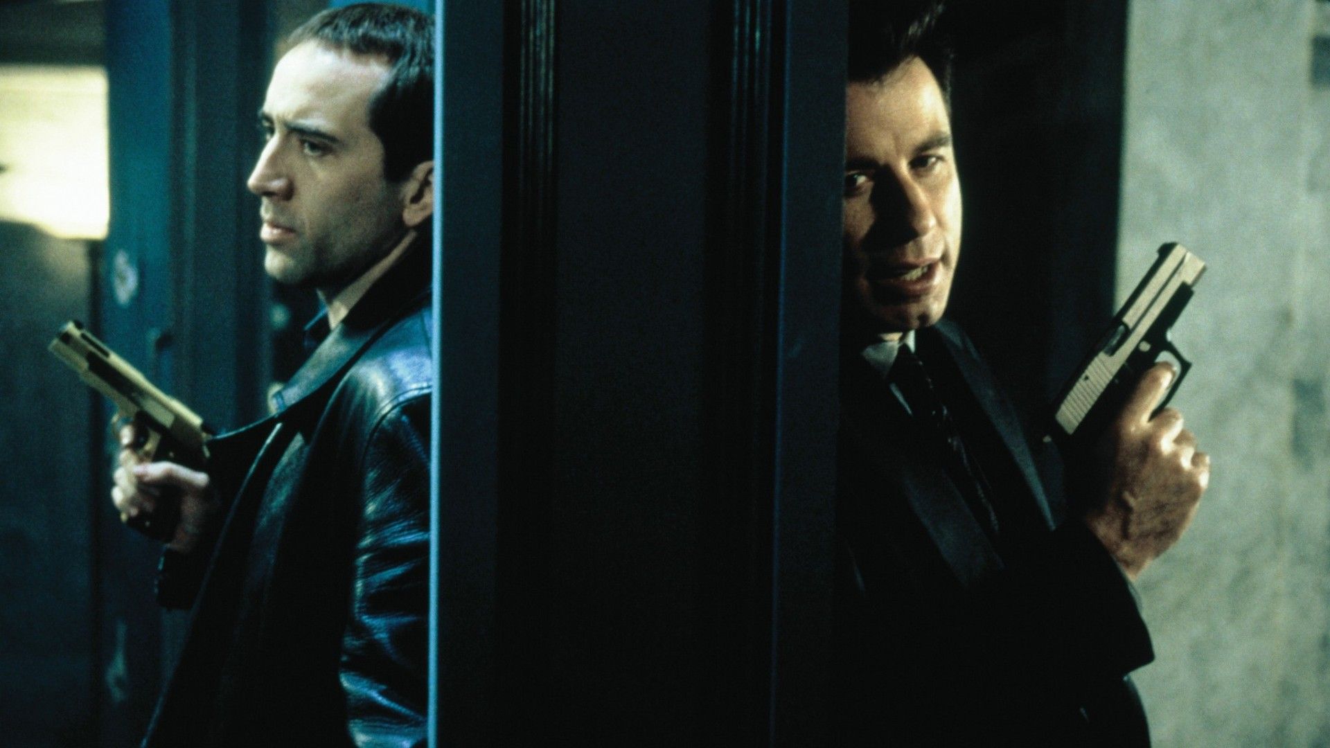 Nicolas Cage e John Travolta in Face/Off
