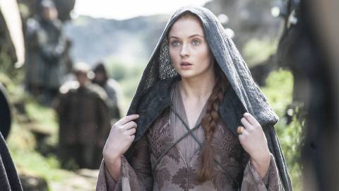 Sansa Stark (Sophie Turner) with a hood over her head in Game of Thrones.
