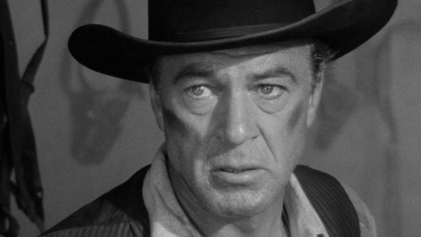 Gary Cooper looks forward with a determined expression in a scene from High Noon