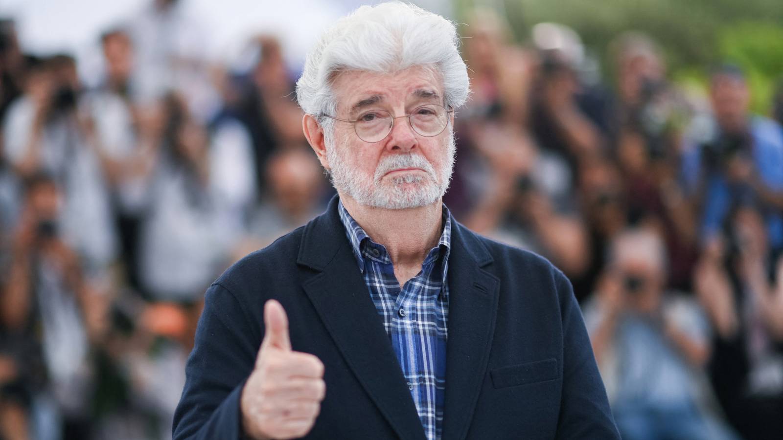 George Lucas giving a thumbs up at the Cannes Film Festival