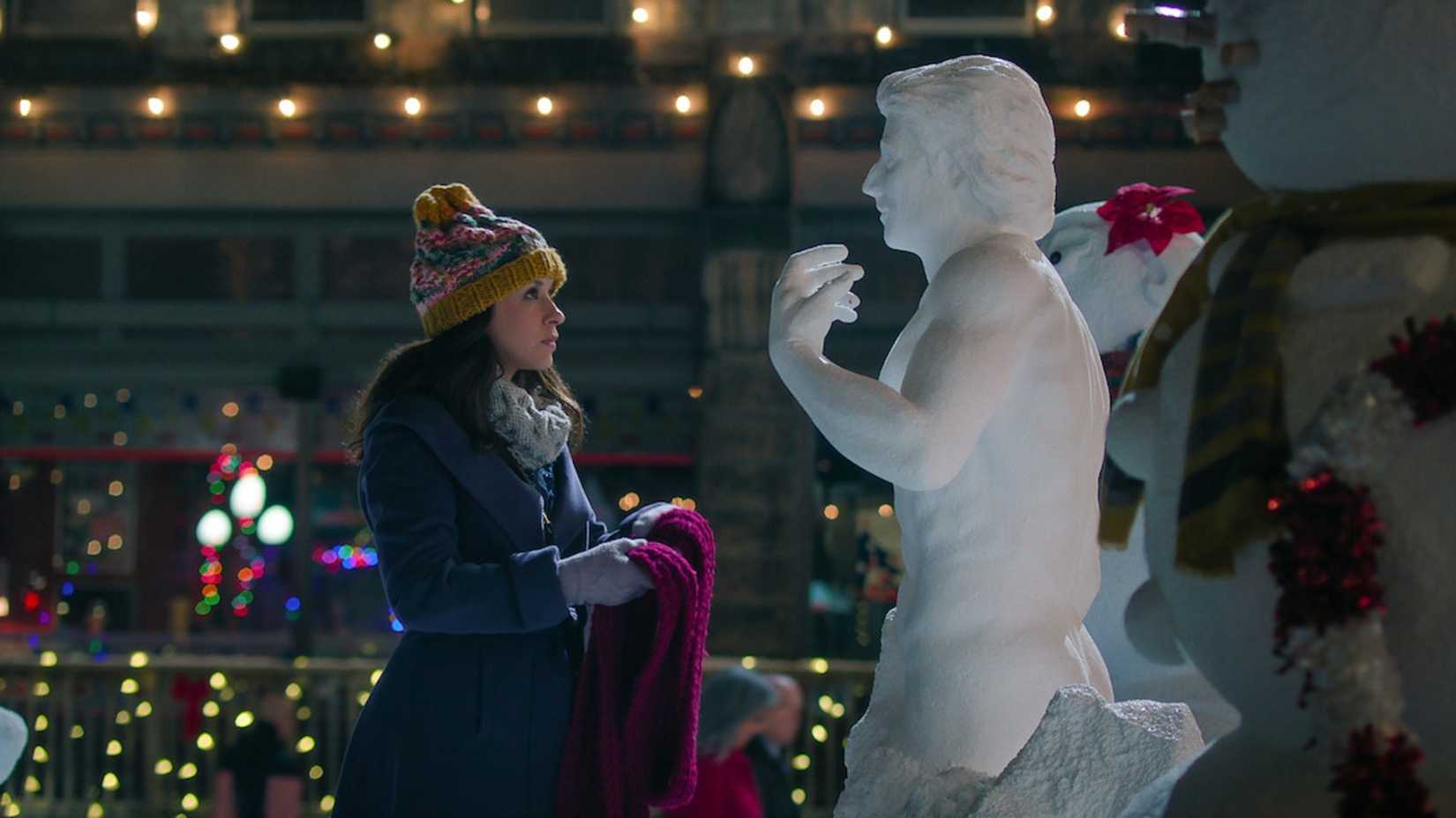 Lacey Chabert talks to a snowman in Hot Frosty