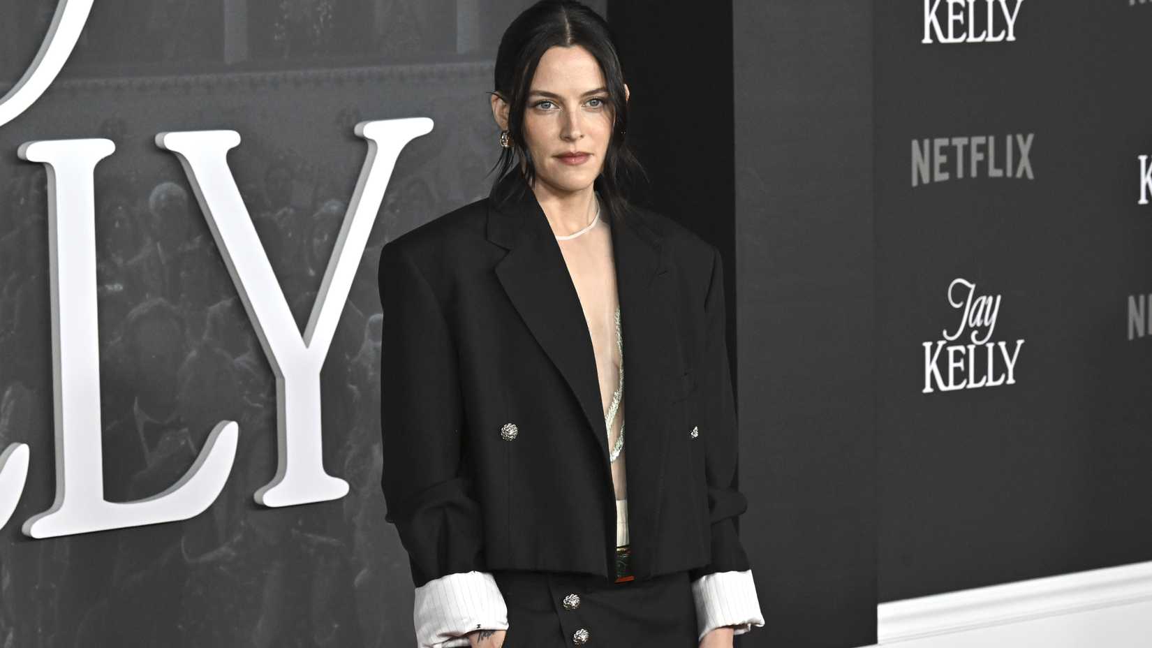 Riley Keough posing at the Los Angeles premiere of Jay Kelly