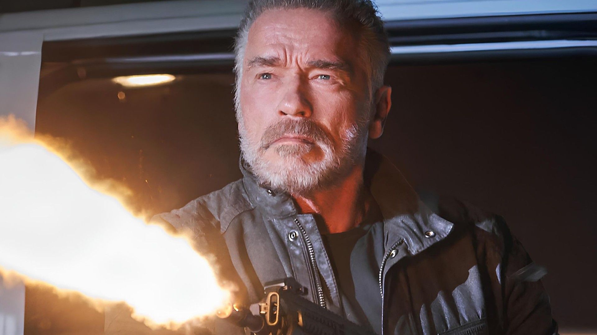 Arnold Schwarzenegger in Terminator Dark Fate Shooting a Gun