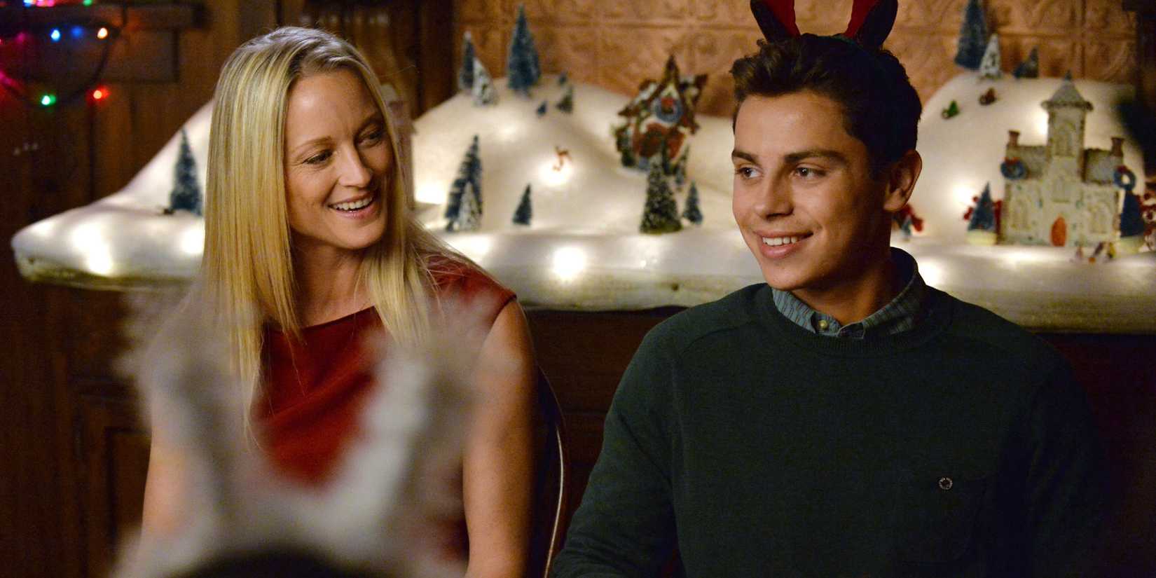 Jake T. Austin as Jesus sitting next to his mother The Fosters.