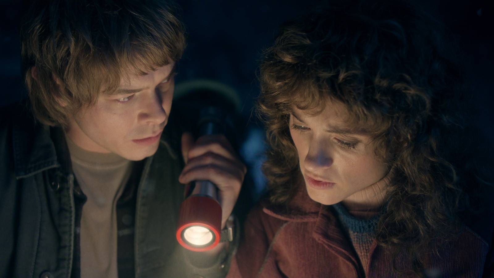 Jonathan Byders and Nancy Wheeler Looking Over Plans in Strnager Things Season 5