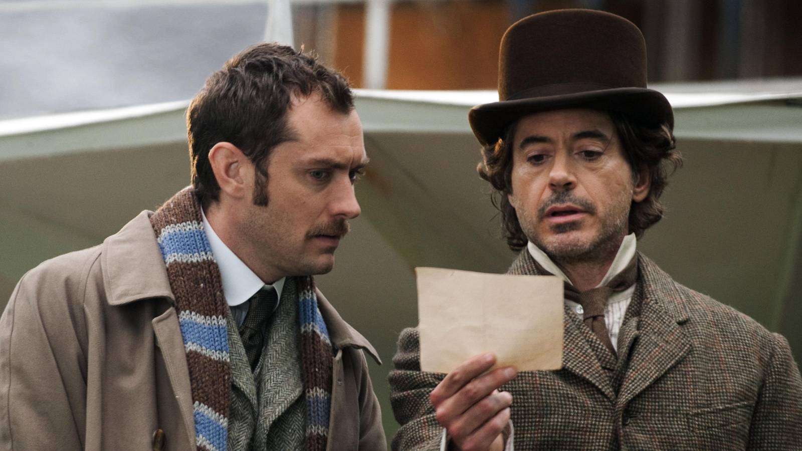 Jude Law and Robert Downey Jr. as Watson and Holmes in Sherlock Holmes A Game of Shadows