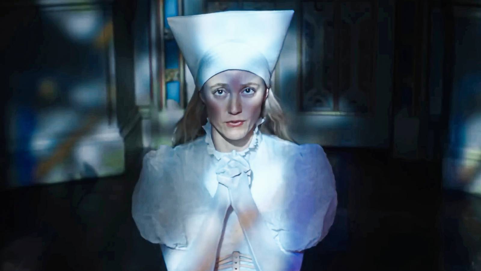 Maika Monroe's Cherry on her knees praying in 100 Nights of Hero