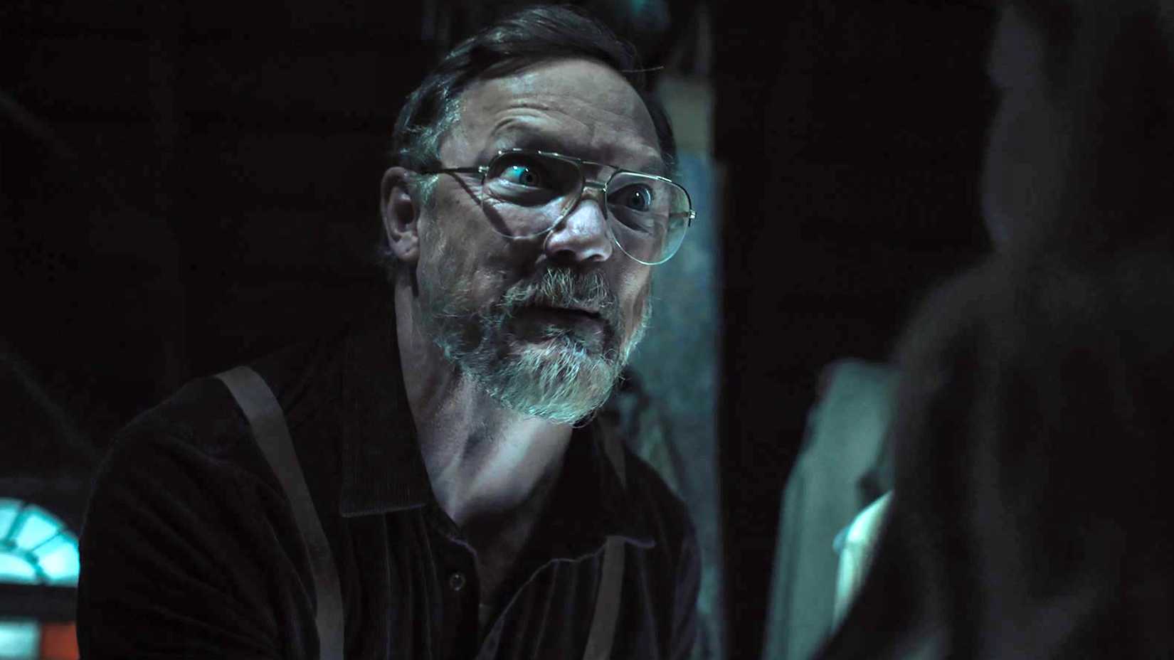 Matthew Lillard as William Afton looking intensely in Vanessa's face in Five Nights at Freddy's 2
