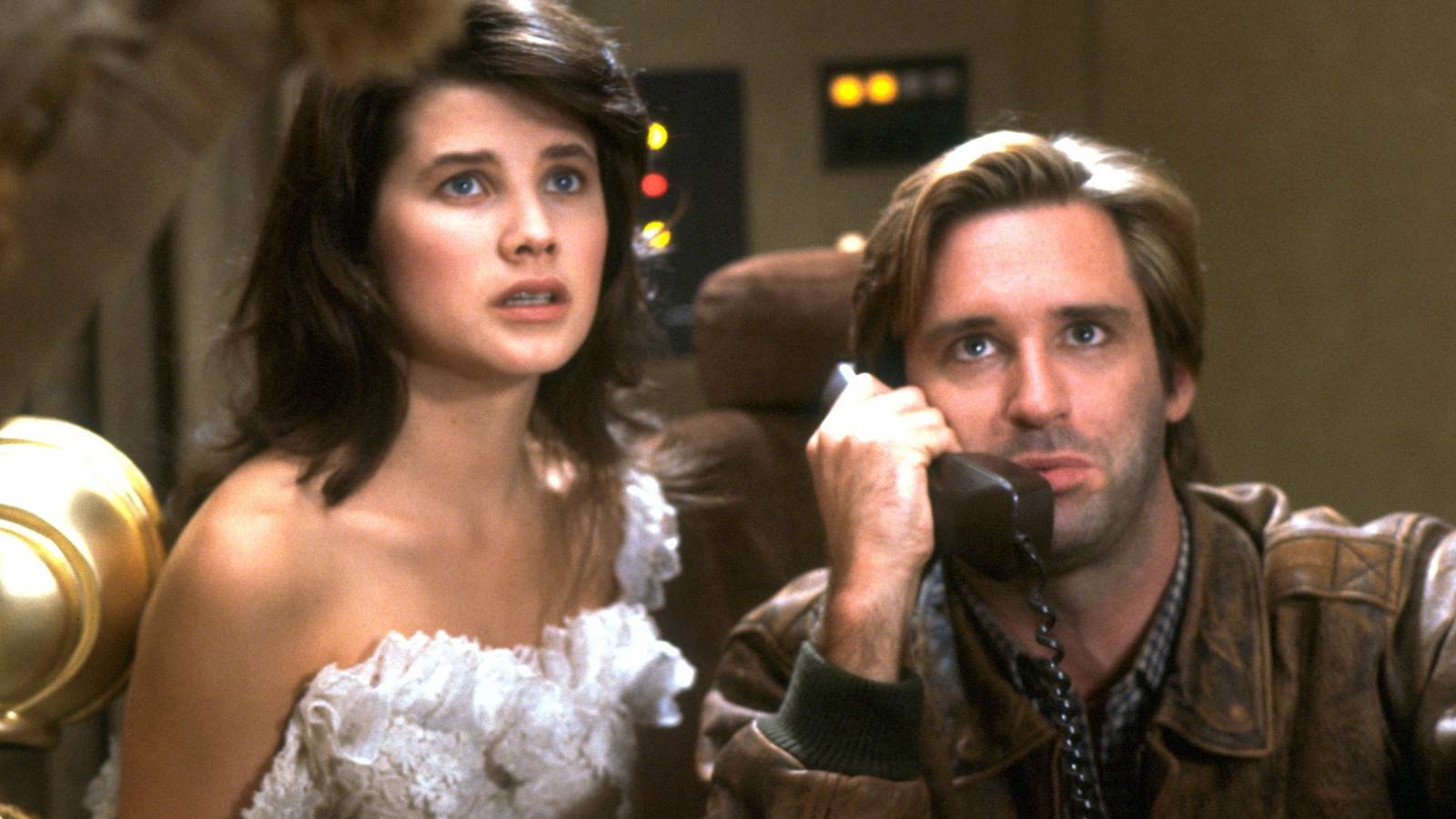 Daphne Zugina beside Bill Pullman on the phone in Spaceballs