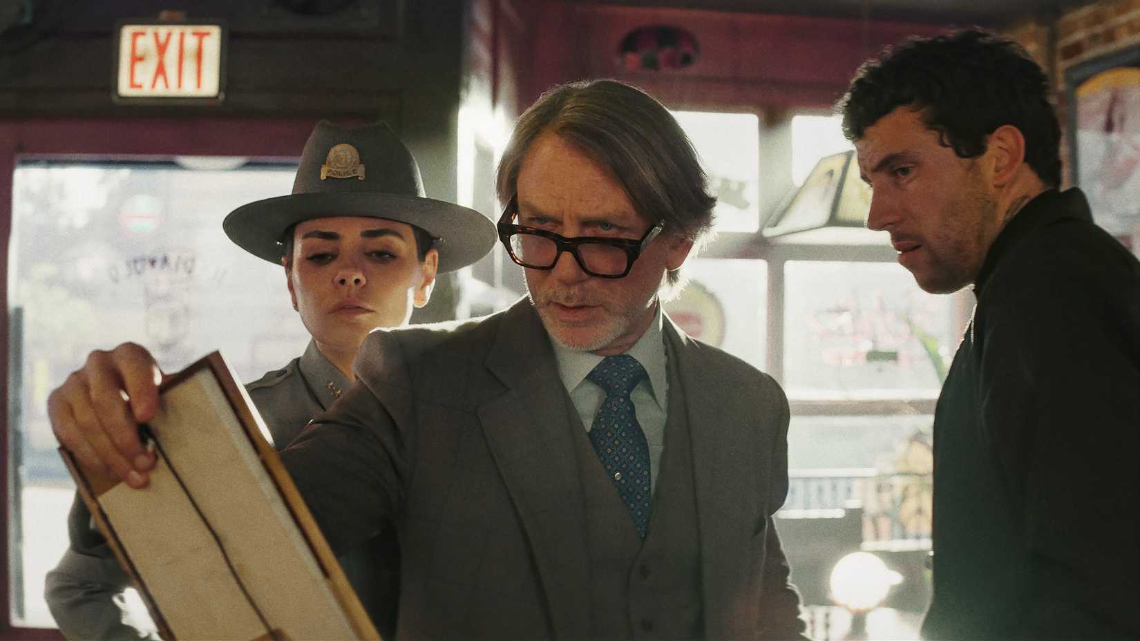 10 Most Rewatchable Movies On Netflix, Ranked By Popularity 5 Chief Geraldine Scott, Benoit Blanc, and Fr. Jud Duplenticy inspect a clue in in Wake Up Dead Man: A Knives Out Mystery