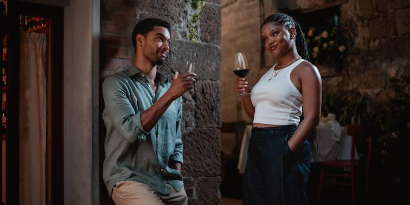 Rege-Jean Page and Halle Bailey drinking in You Me and Tuscany