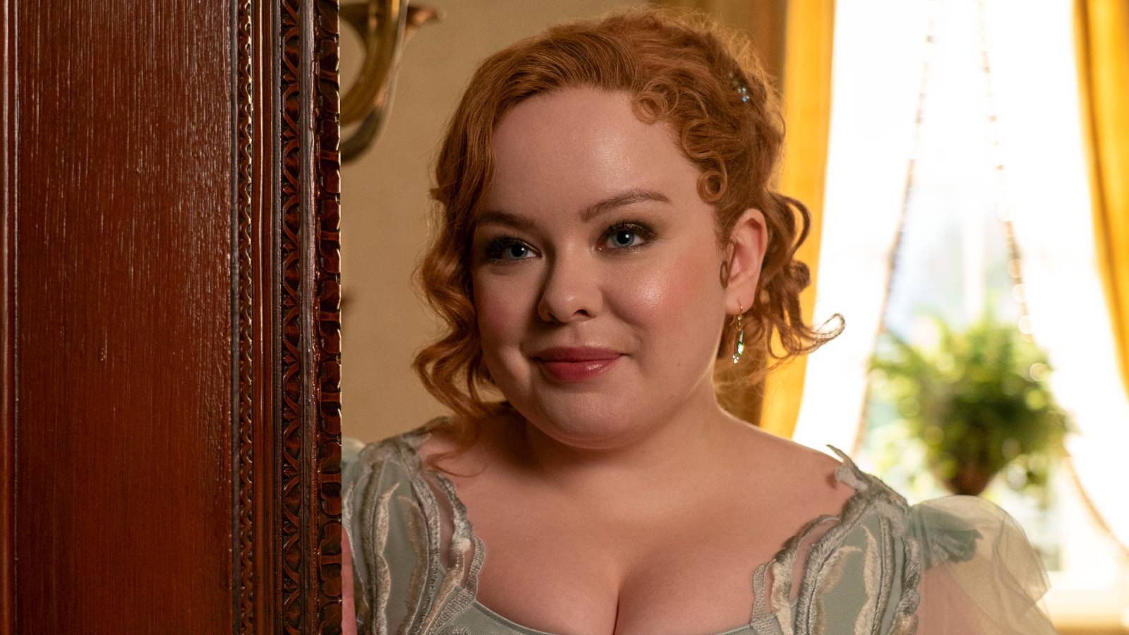 Nicola Coughlan smiling as Penelope in Bridgerton season 3