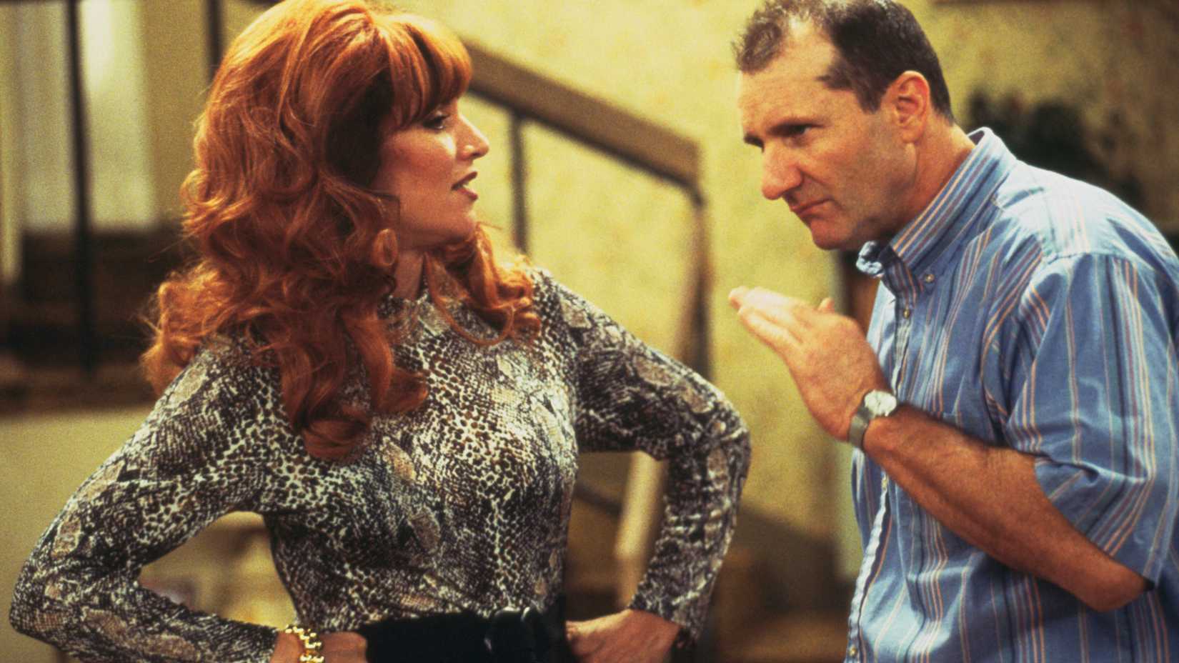 Peggy (Katey Sagal) and Al Bundy (Ed O'Neill) bantering in Married... with Children