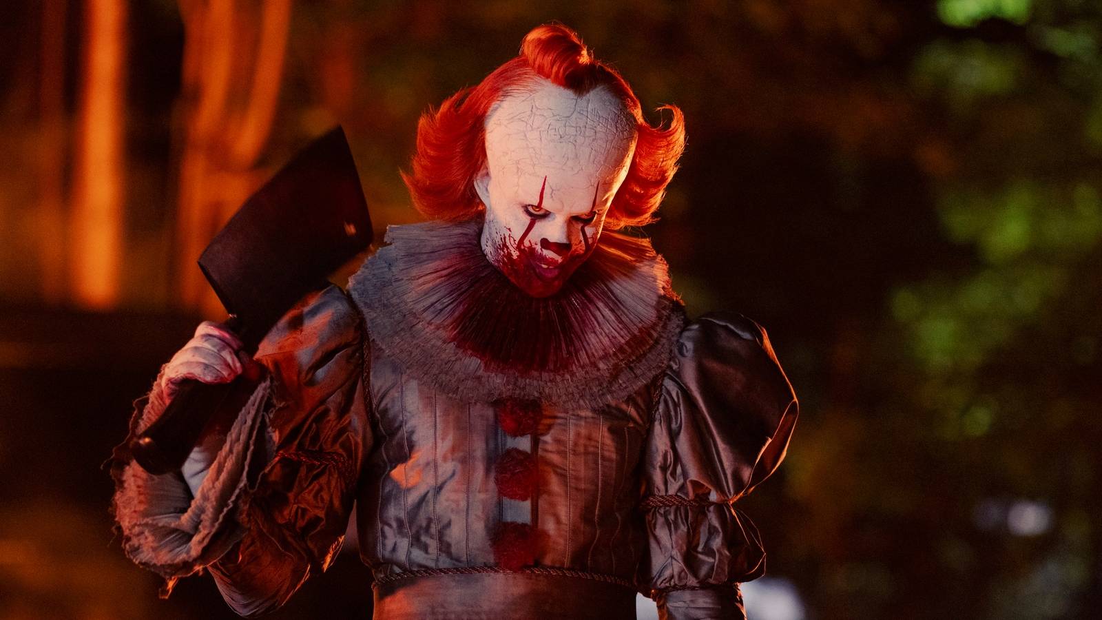Pennywise holding a machete in Welcome to Derry