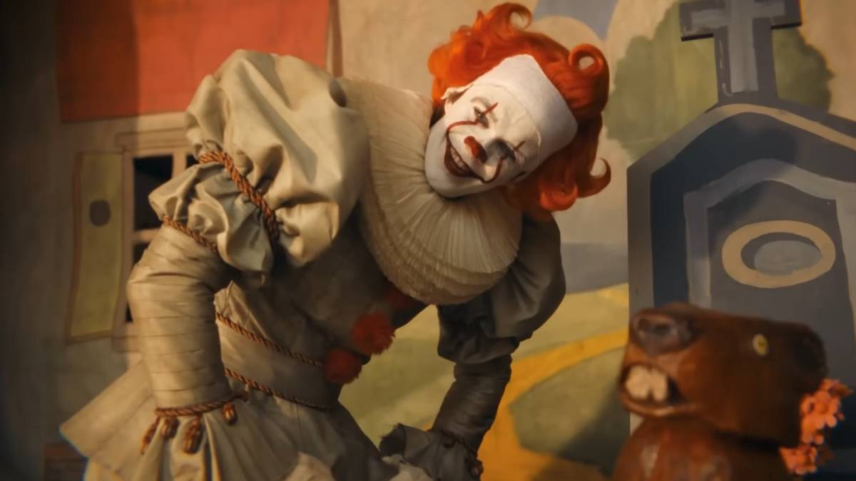 Pennywise smiling in It Welcome to Derry