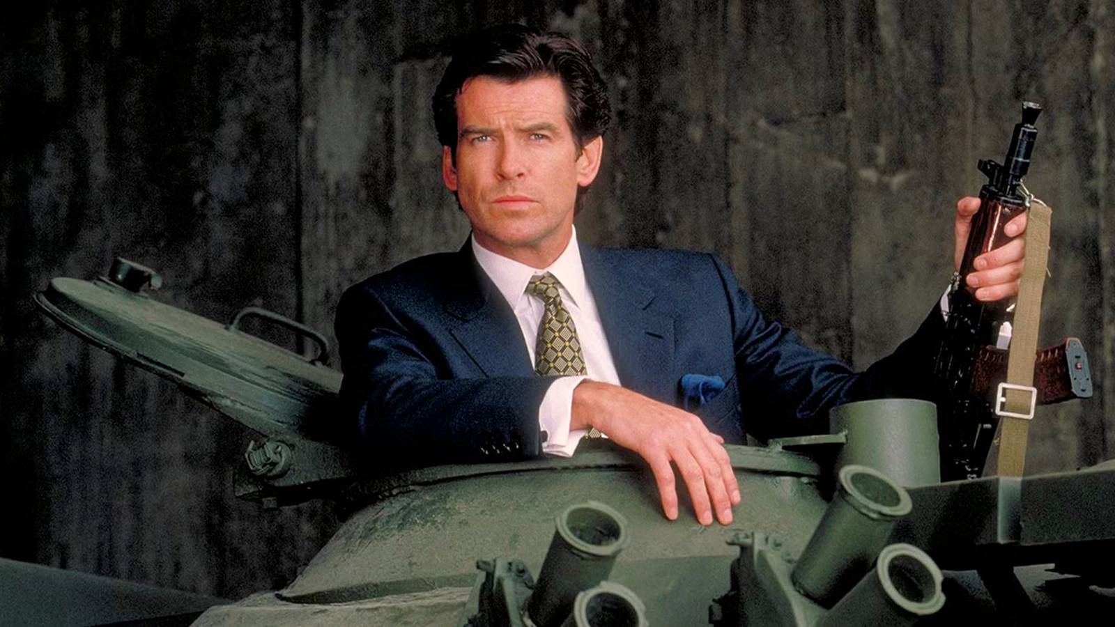 Pierce Brosnan as James Bond sitting in a tank.