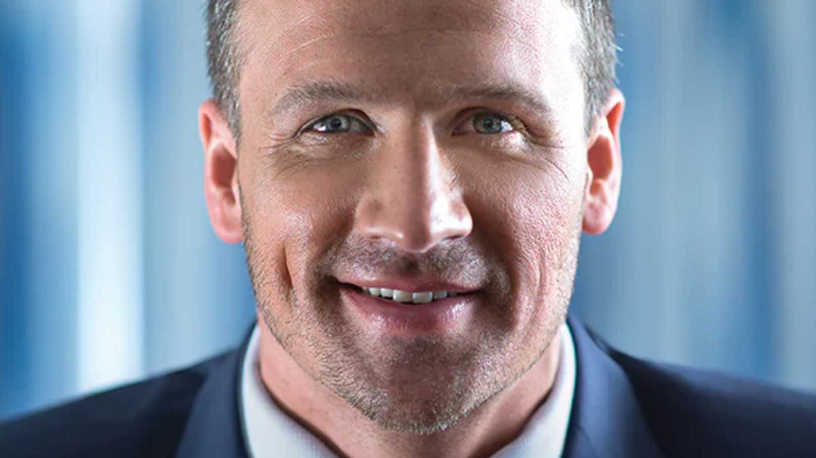 Ryan Lochte smiling in headshot