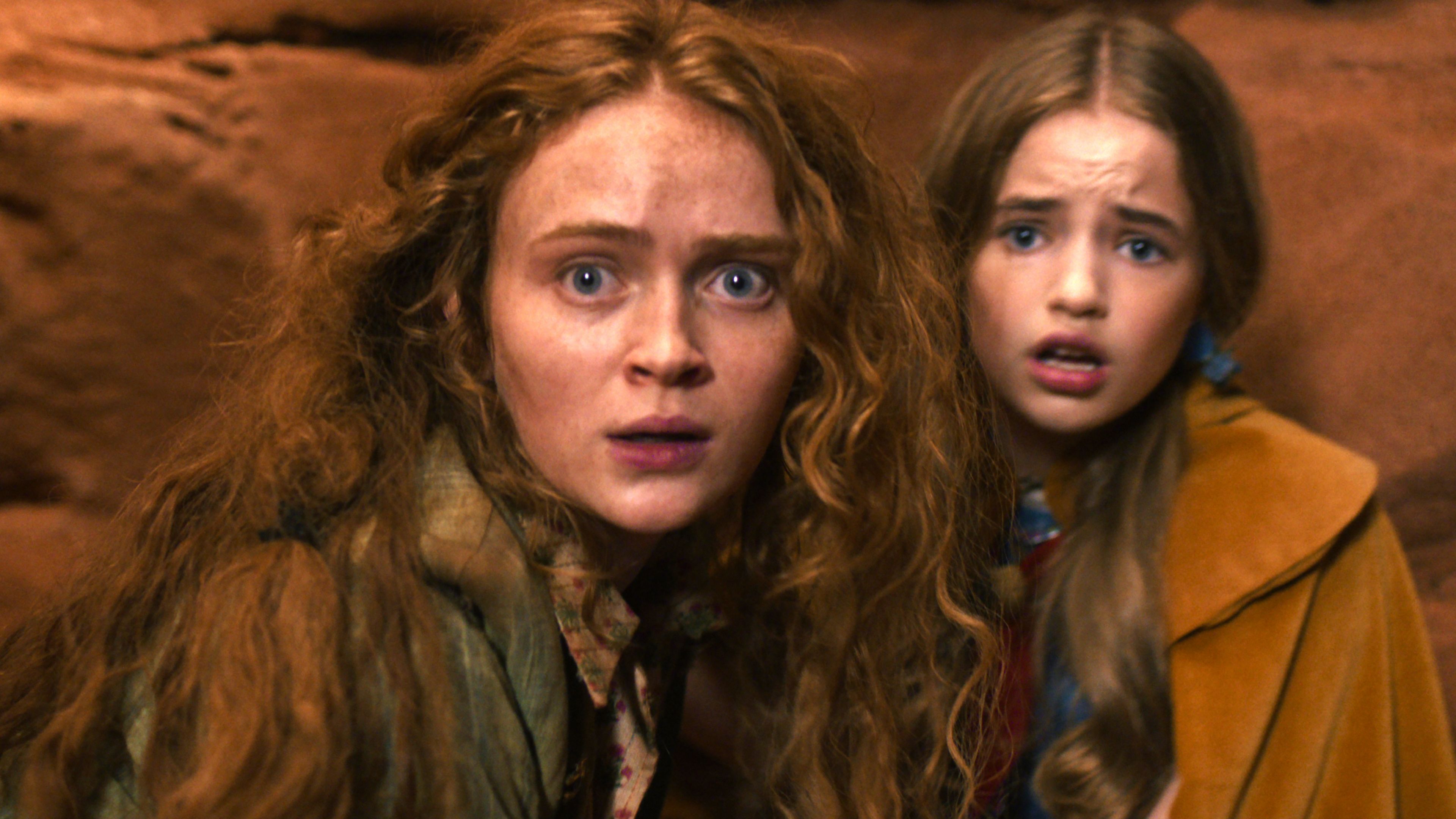 Sadie Sink as Max and Nell Fisher as Holly in the cave in Stranger Things season 5 vol 2