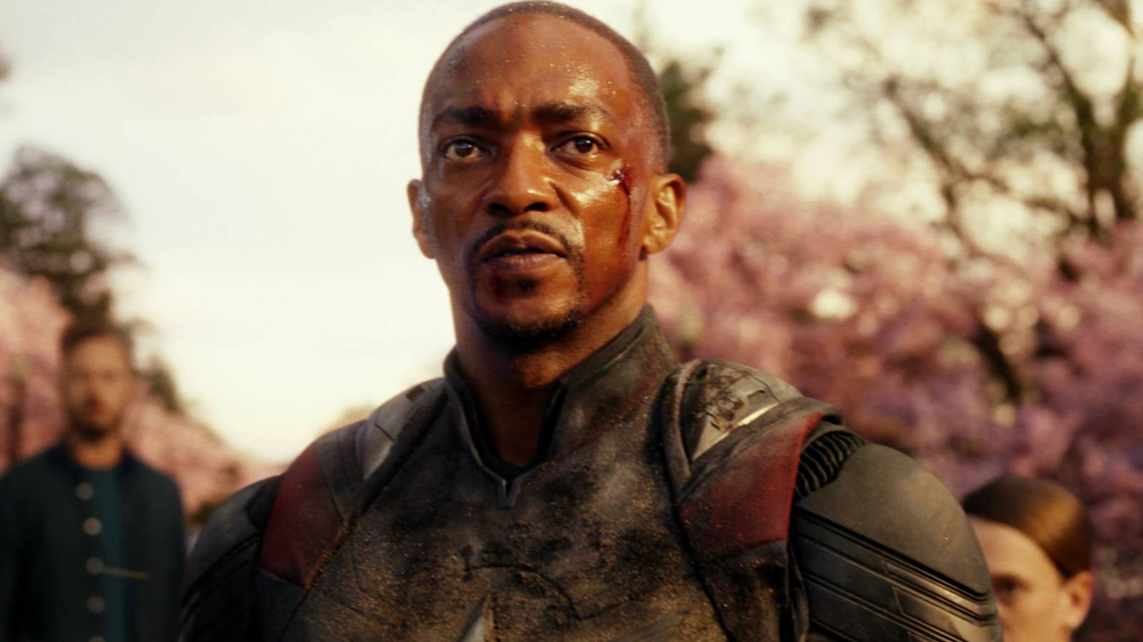 Sam Wilson's Captain America with blood on his face in Brave New World