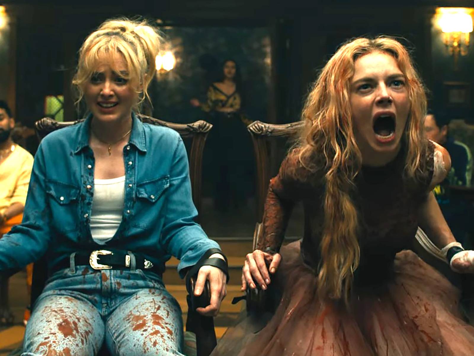 samara-weaving-s-grace-screaming-while-tied-up-next-to-kathryn-newton-s-faith-in-ready-or-not-2-here-i-come.avif