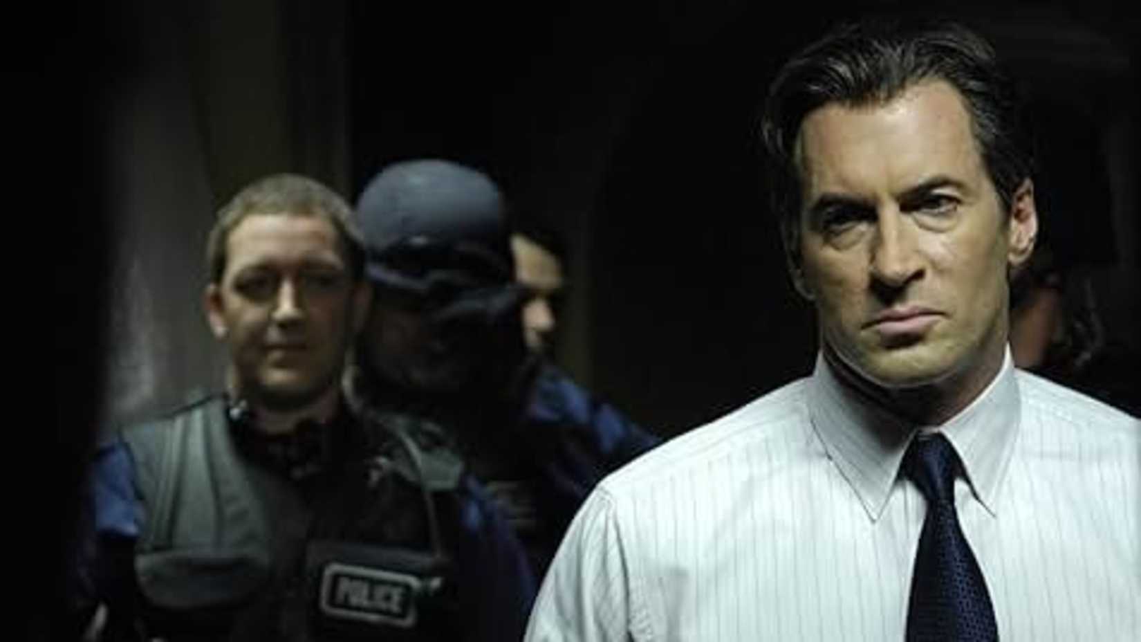 Scott Patterson e Simon Reynolds em Saw IV (2007)