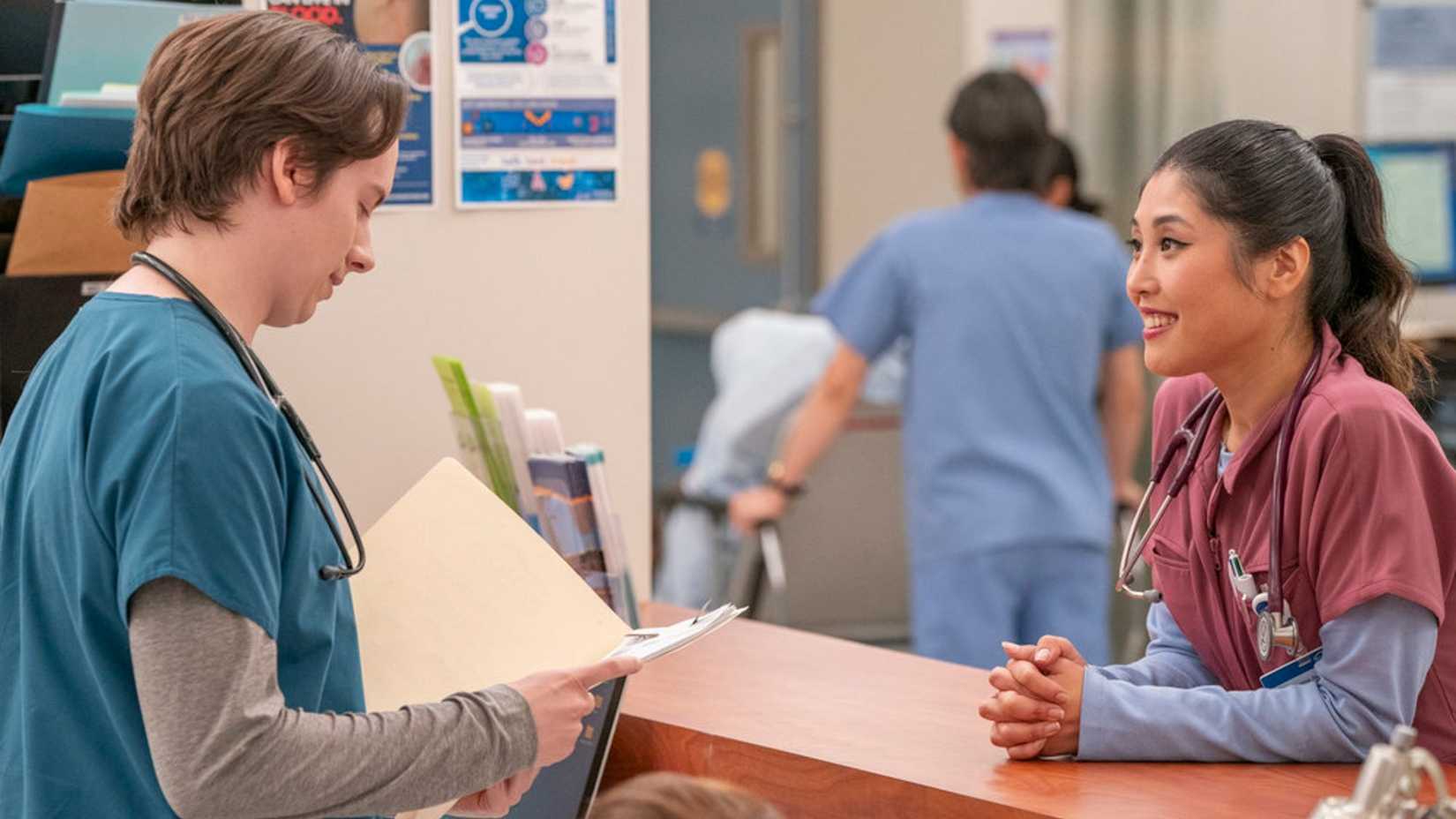 St. Denis Medical's Mekki Leeper (Matt) and Kahyun Kim (Serena) Smiling