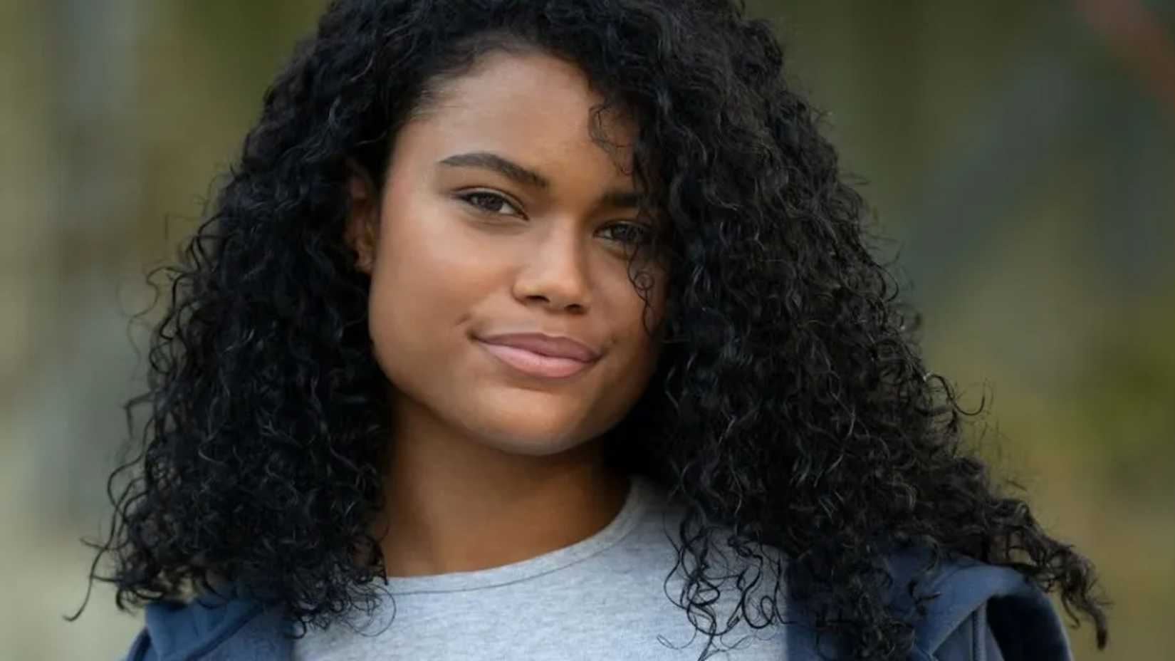 Tamara Smart smirking in a photoshoot for Percy Jackson season 2