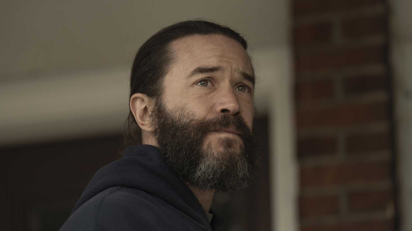 Robbie Prendergrast (Tom Pelphrey) looking over his shoulder in Task.