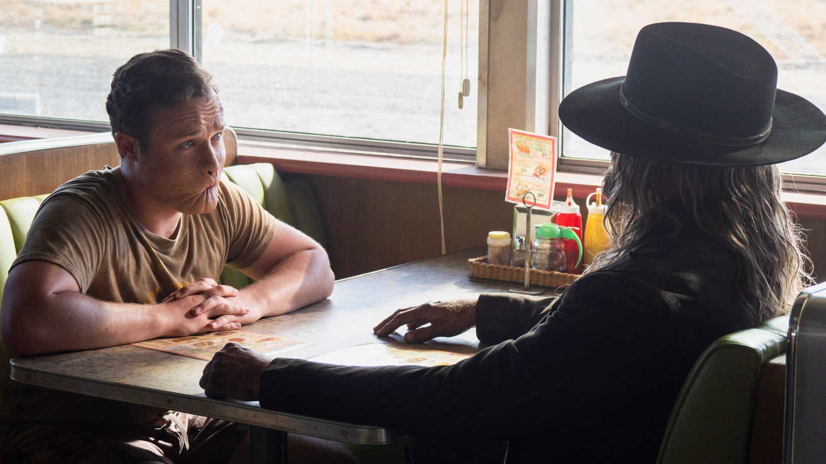 Graham McTavish and Ian Colletti sitting in a diner booth in Preacher (2016) season 4