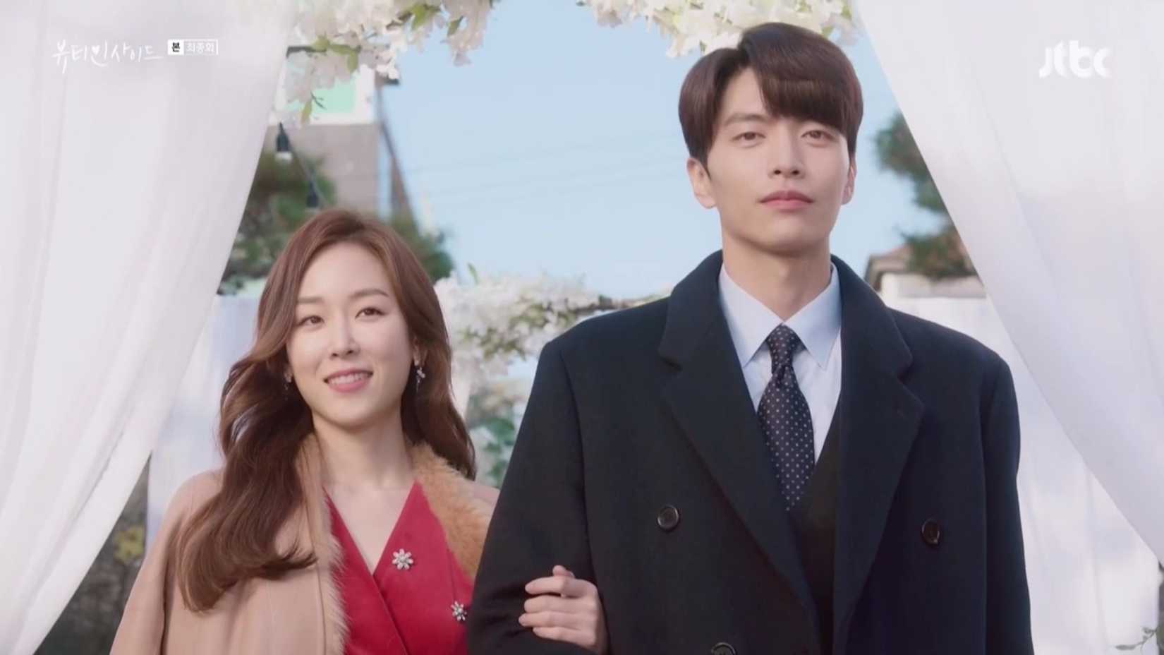 Han Se-gye (Seo Hyun-jin) and Seo Do-jae (Lee Min-ki) walking into a wedding in The Beauty Inside.
