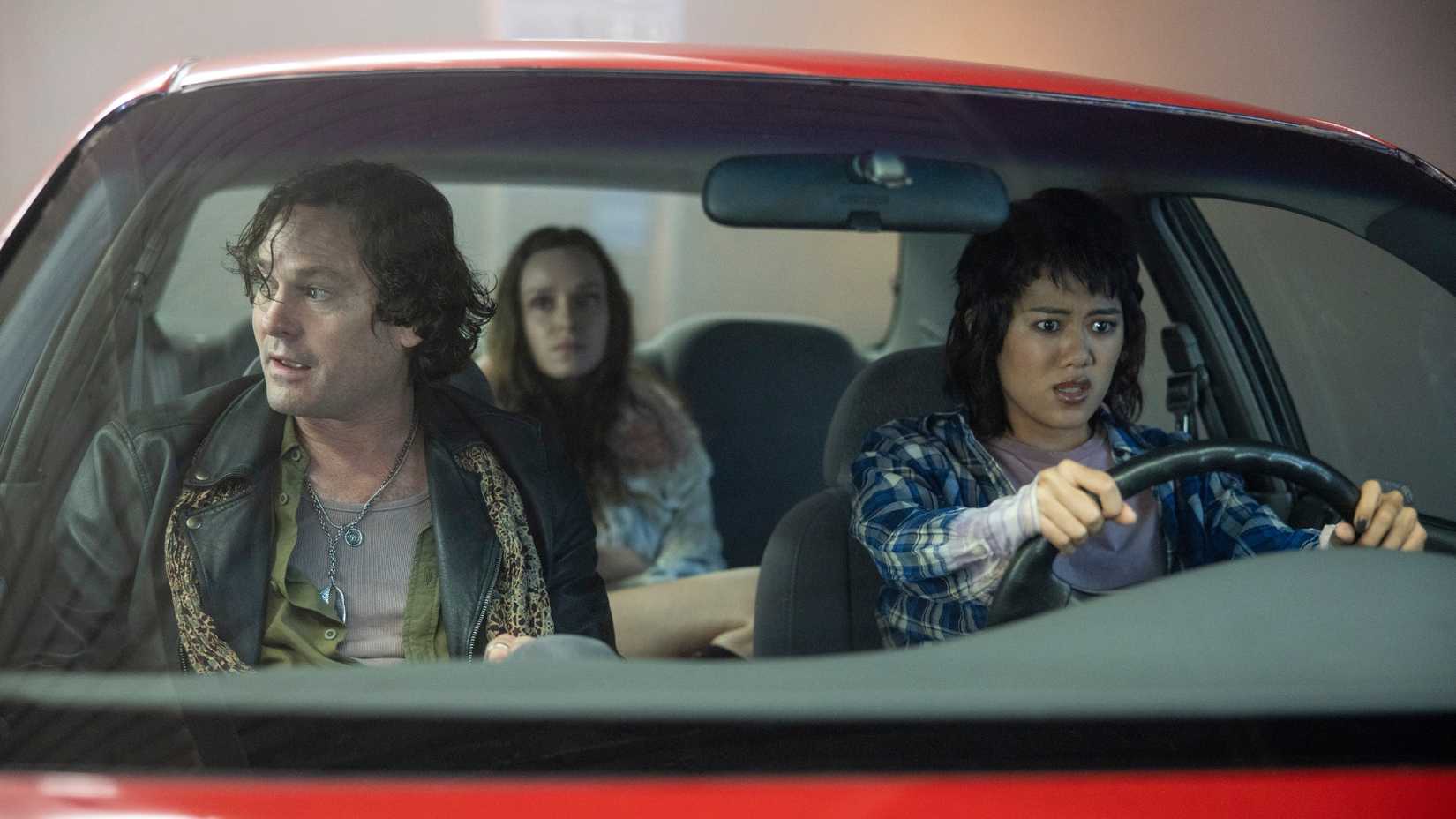 10 TV Shows We Thought Would Be The Next Stranger Things 3 Still with a trio of characters from The Midnight Club sitting in a car.
