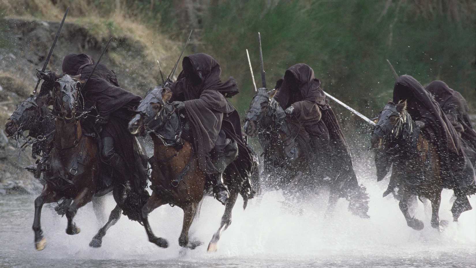 Os Nazgûl cavalgando em The Lord of the Rings.