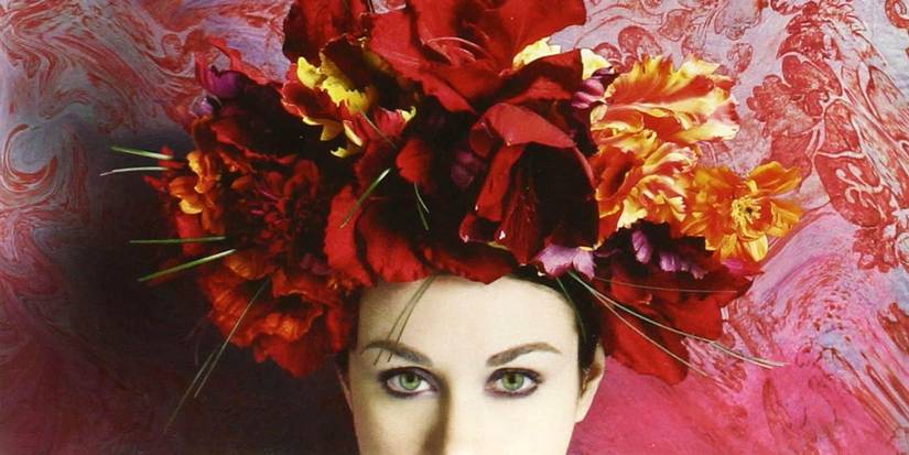 The Ring and the Crown alternative book cover shows a woman with a flower crown in front of a marbled background.