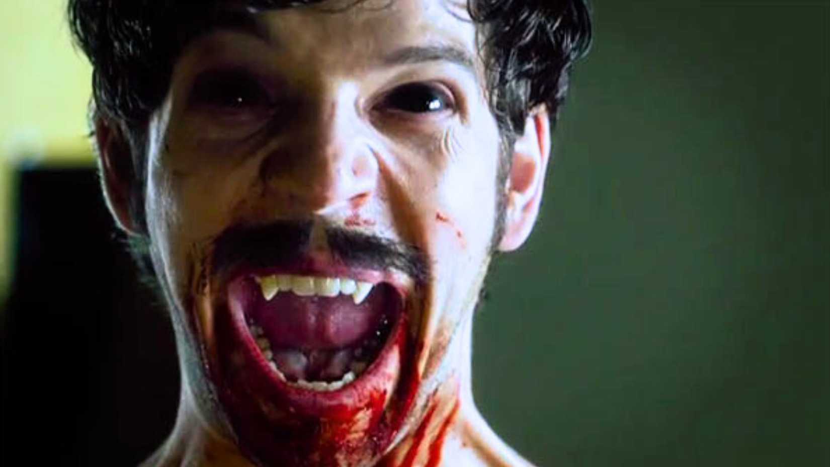 The vampire Hal showing his fangs in Being Human