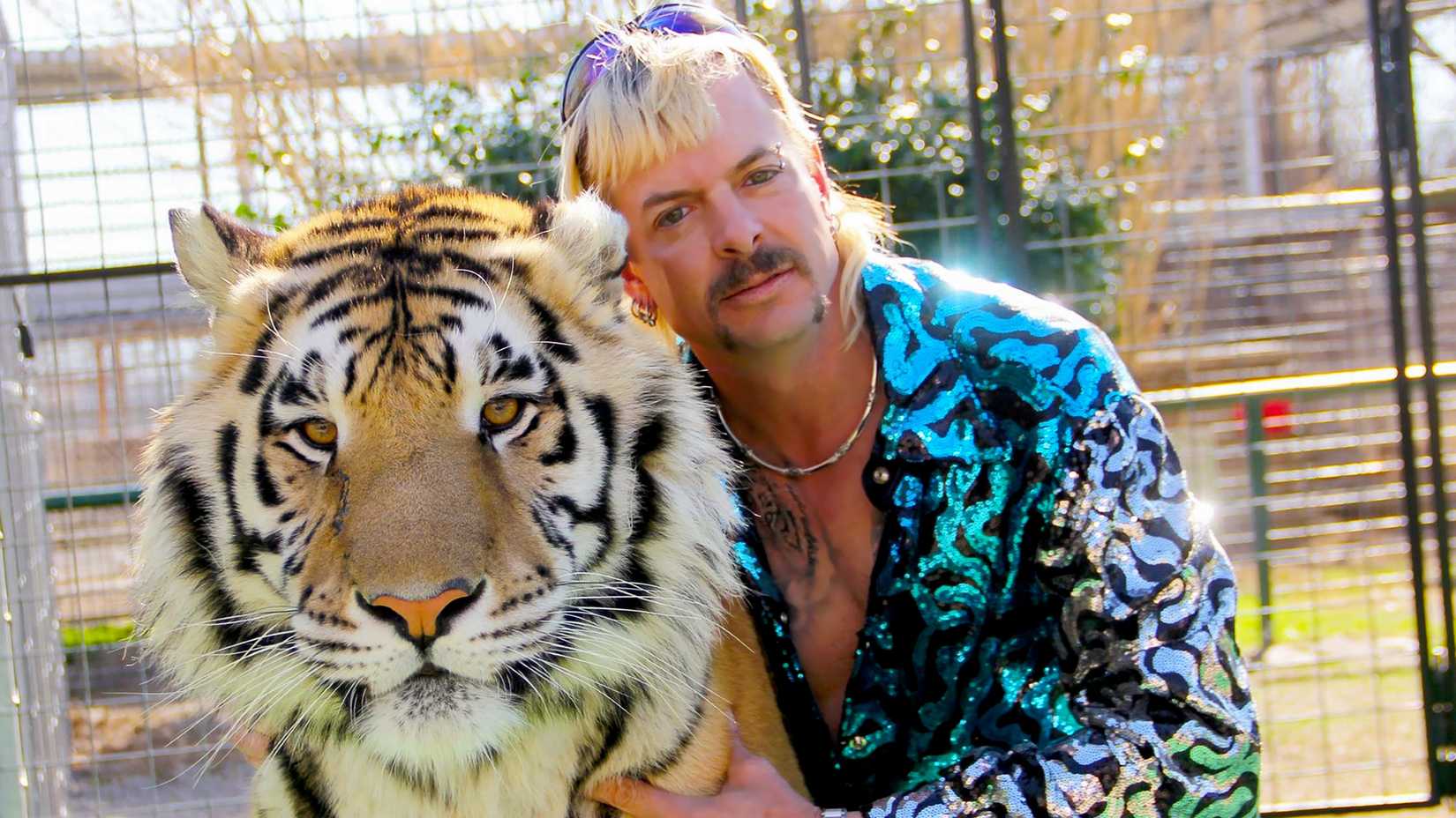 tiger king still featuring joe exotic and a tiger