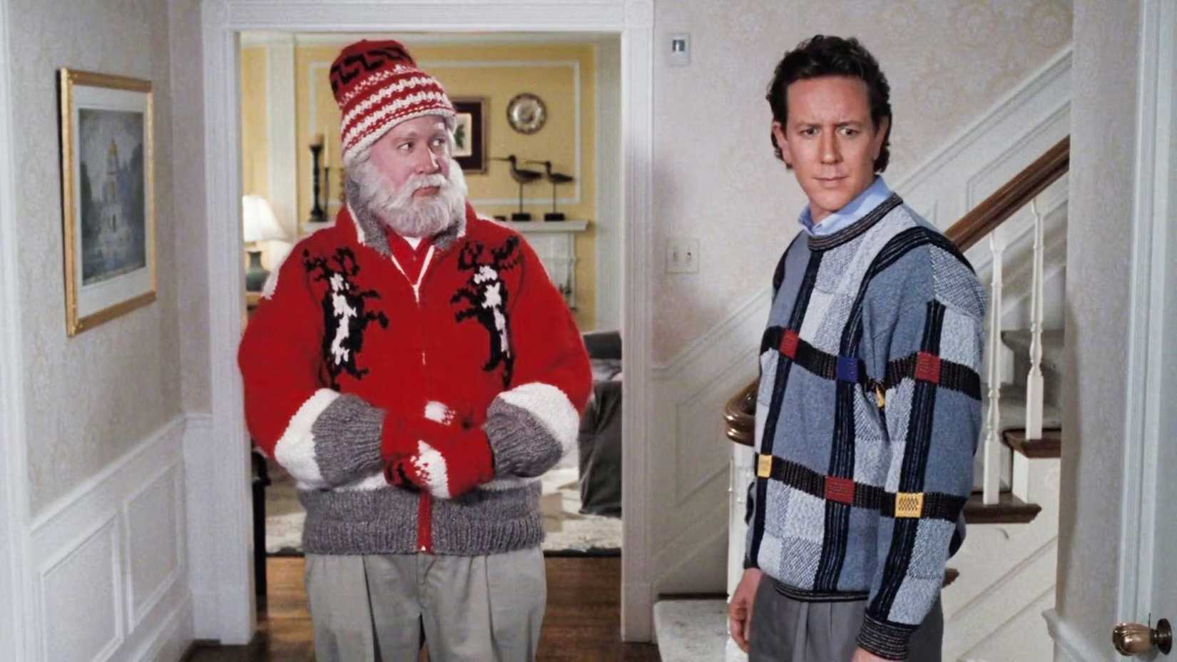 Tim Allen as Santa Claus looking at Judge Reinhold as Dr Neil Miller in The Santa Clause