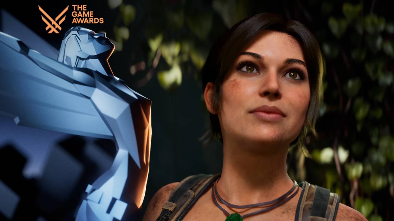 Lara Croft in Tomb Raider: Legacy of Atlantis next to a Game Awards statuette.