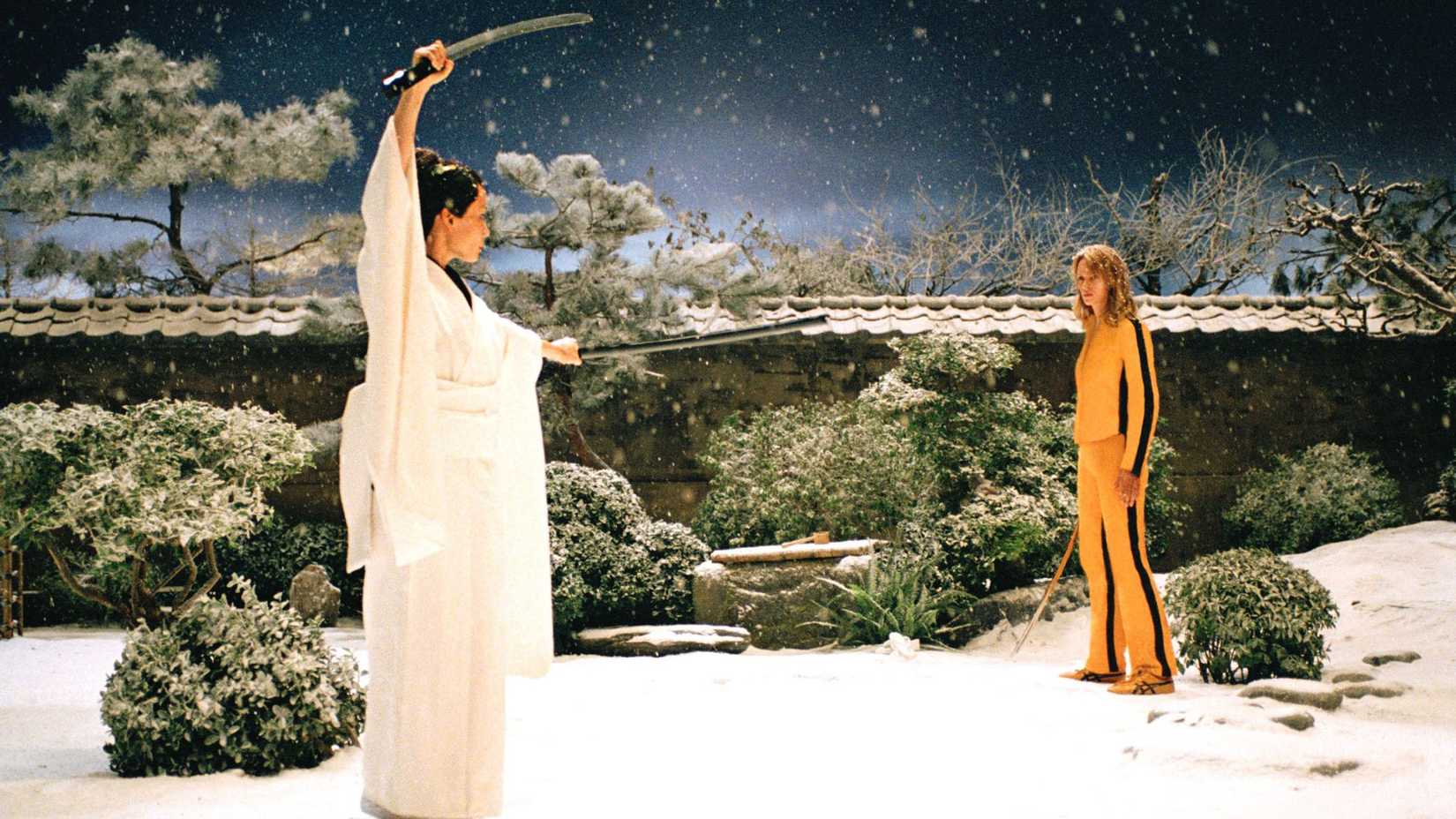 Uma Thurman as The Bride and Lucy Liu as O-Ren about to fight in the snow in Kill Bill