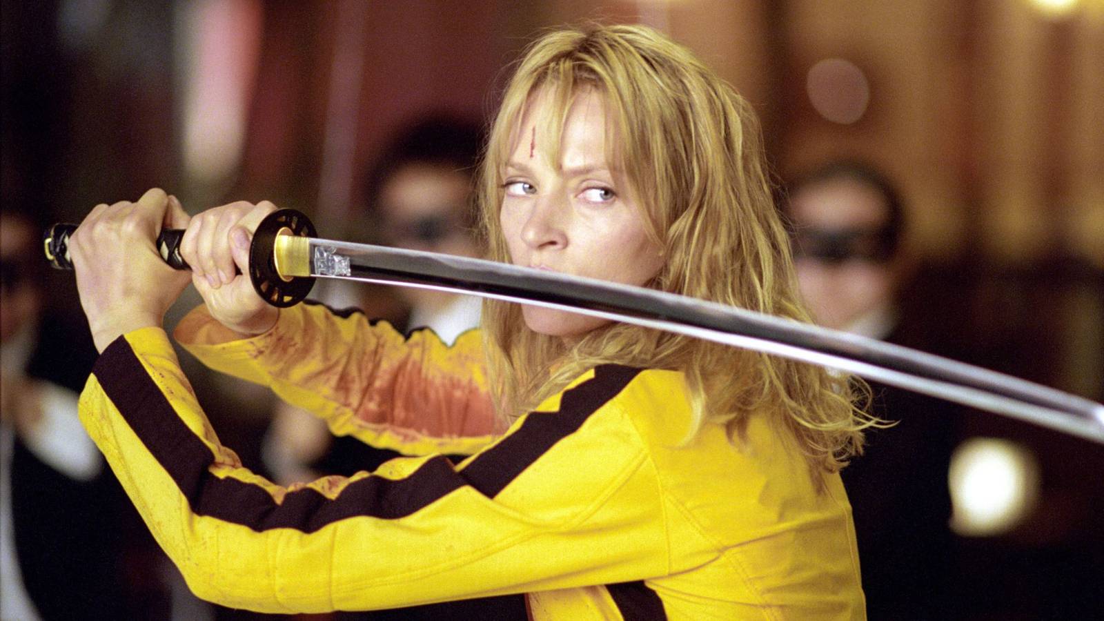 Uma Thurman as The Bride with a sword in Kill Bill