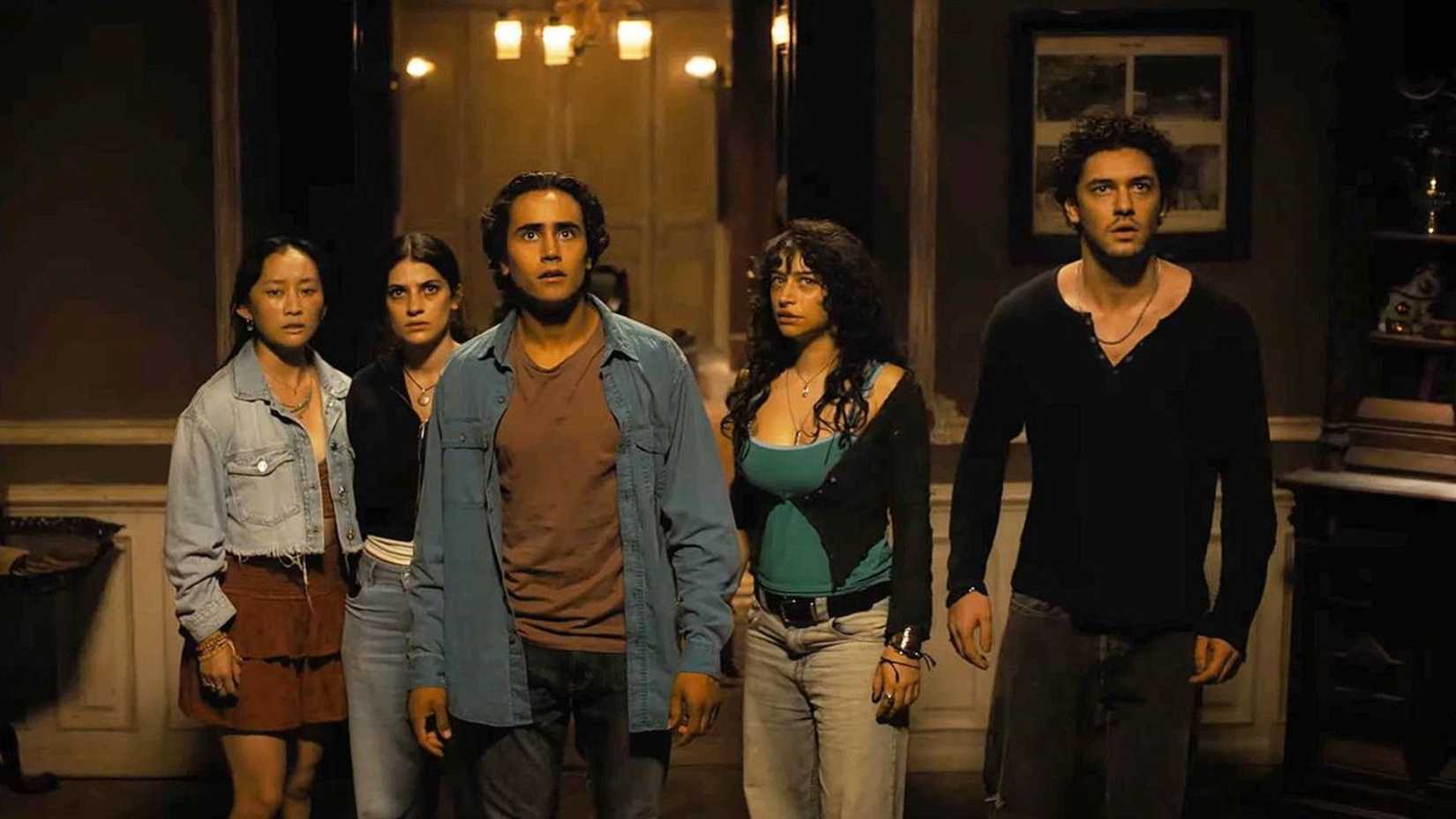 The friends look shocked in Until Dawn