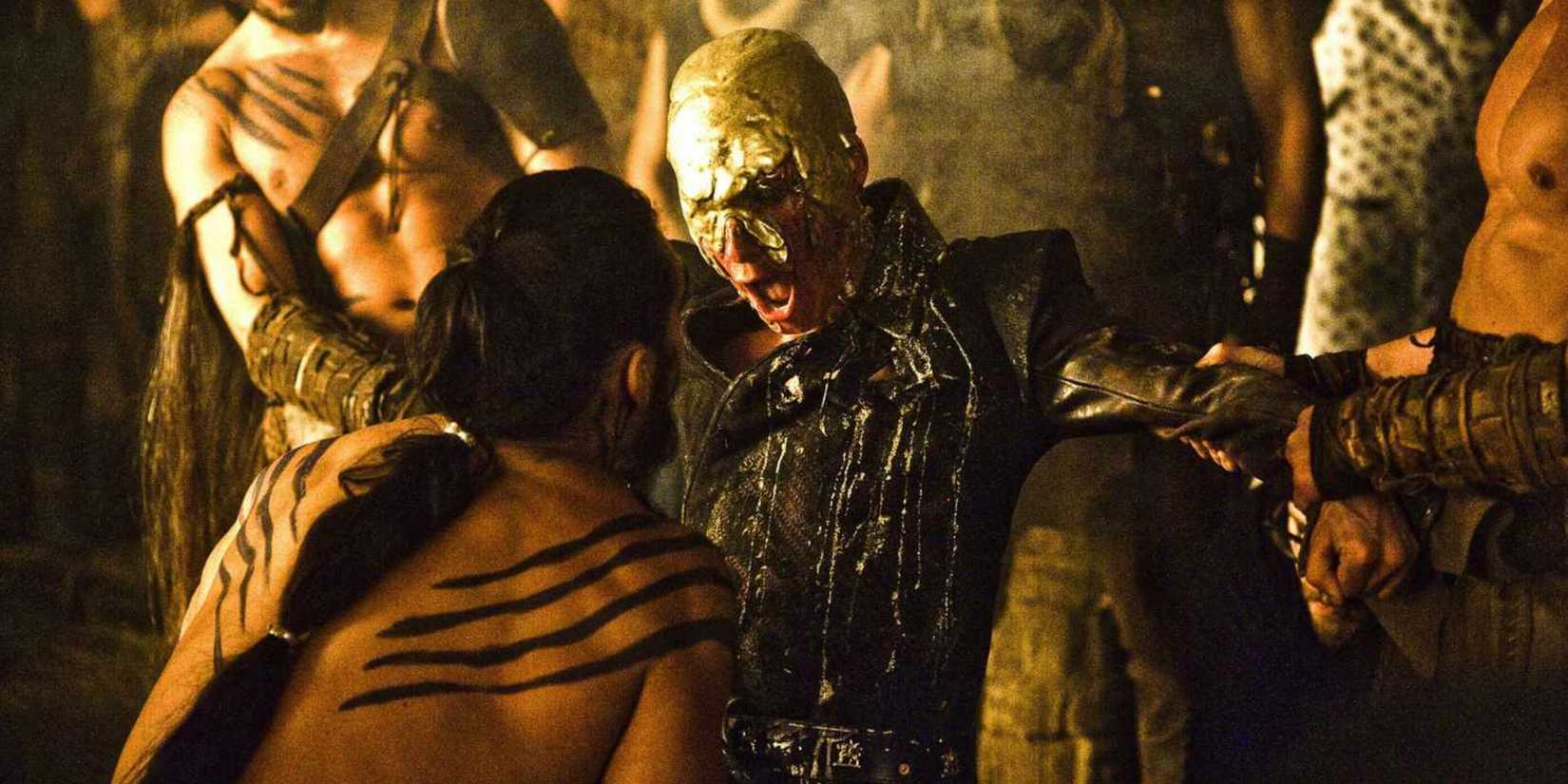 Viserys with molten gold on his head in Game of Thrones