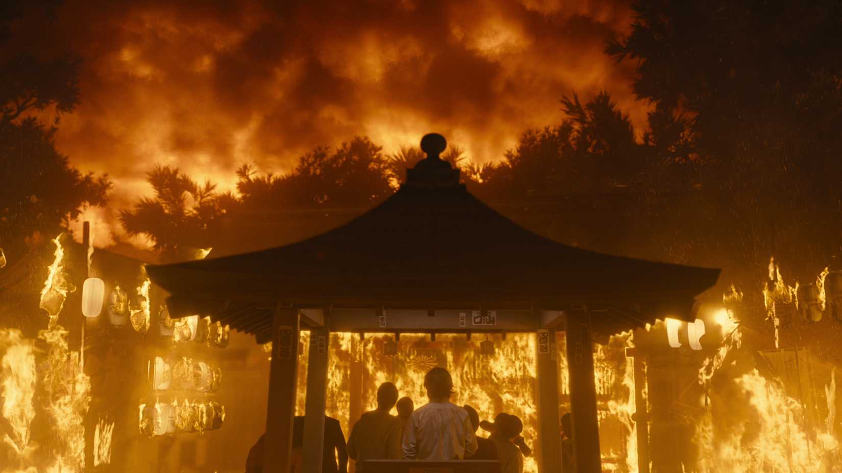Alice in Borderland characters in front of a burning shrine